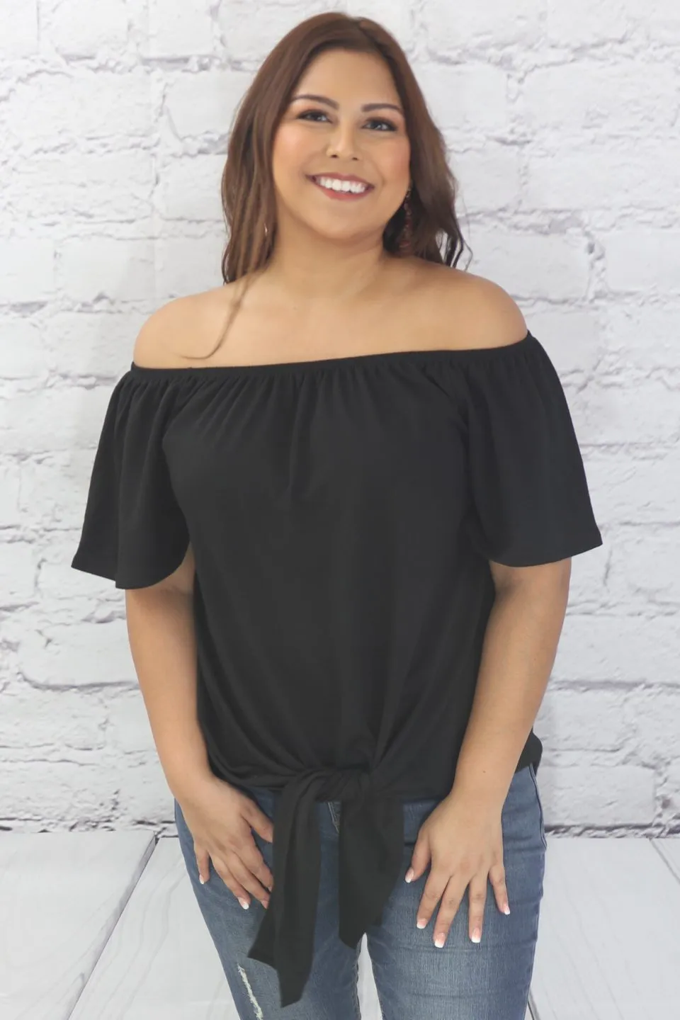 Off the shoulder solid knit top with self tie knot